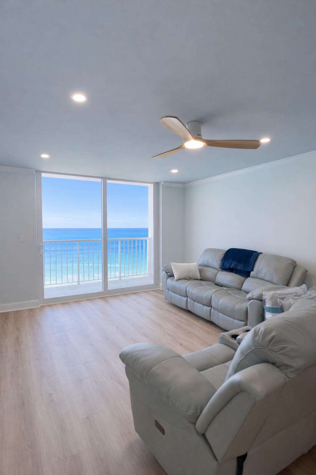 400 North Surf Road, Unit 1105 Hollywood, FL 33019 - Photo 7 of 15 a living room with furniture and large windows