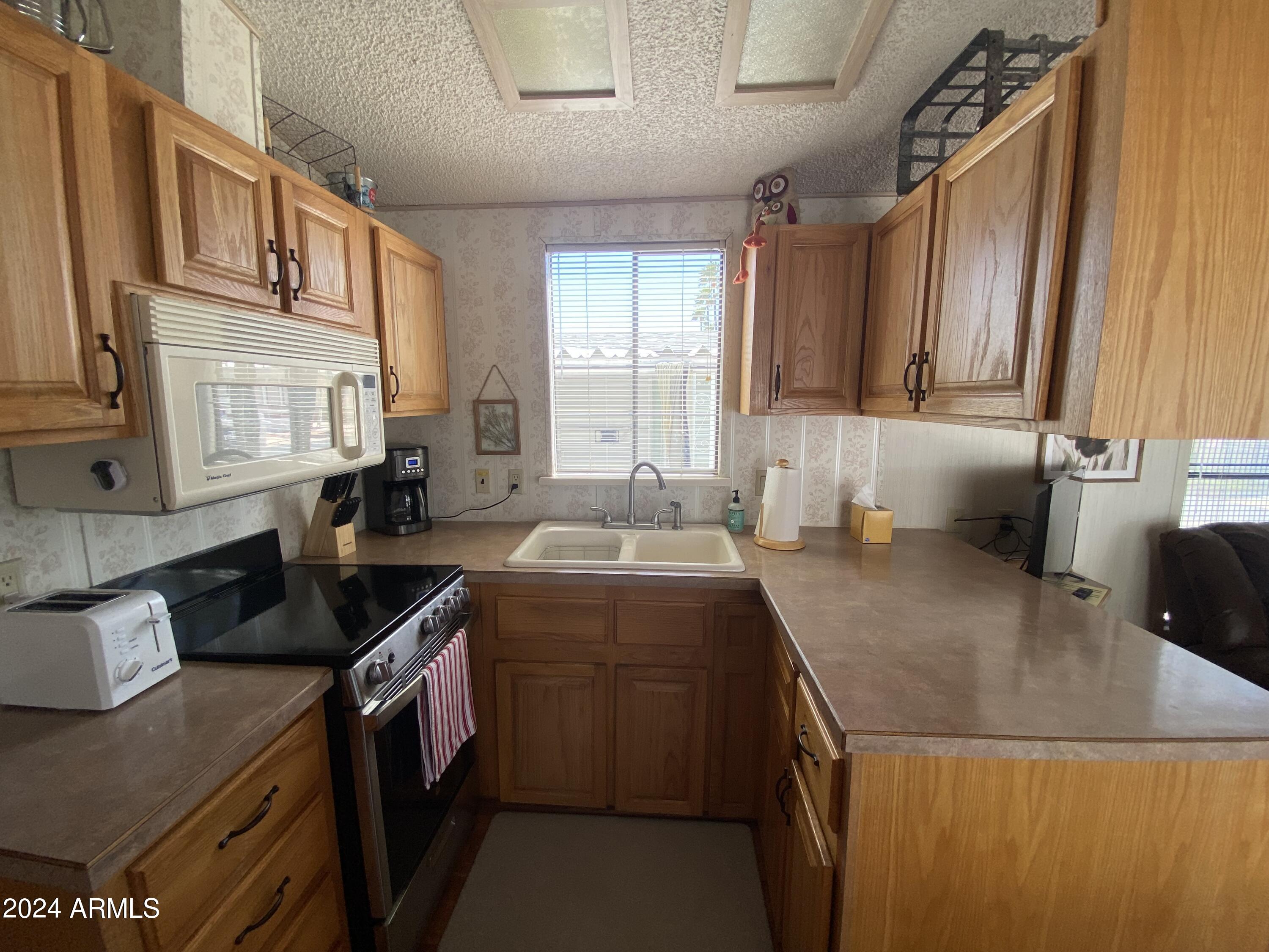 1098 South Shoshone Drive, Unit 98 Apache Junction, AZ 85119 - Photo 2 of 31 IMG_0041