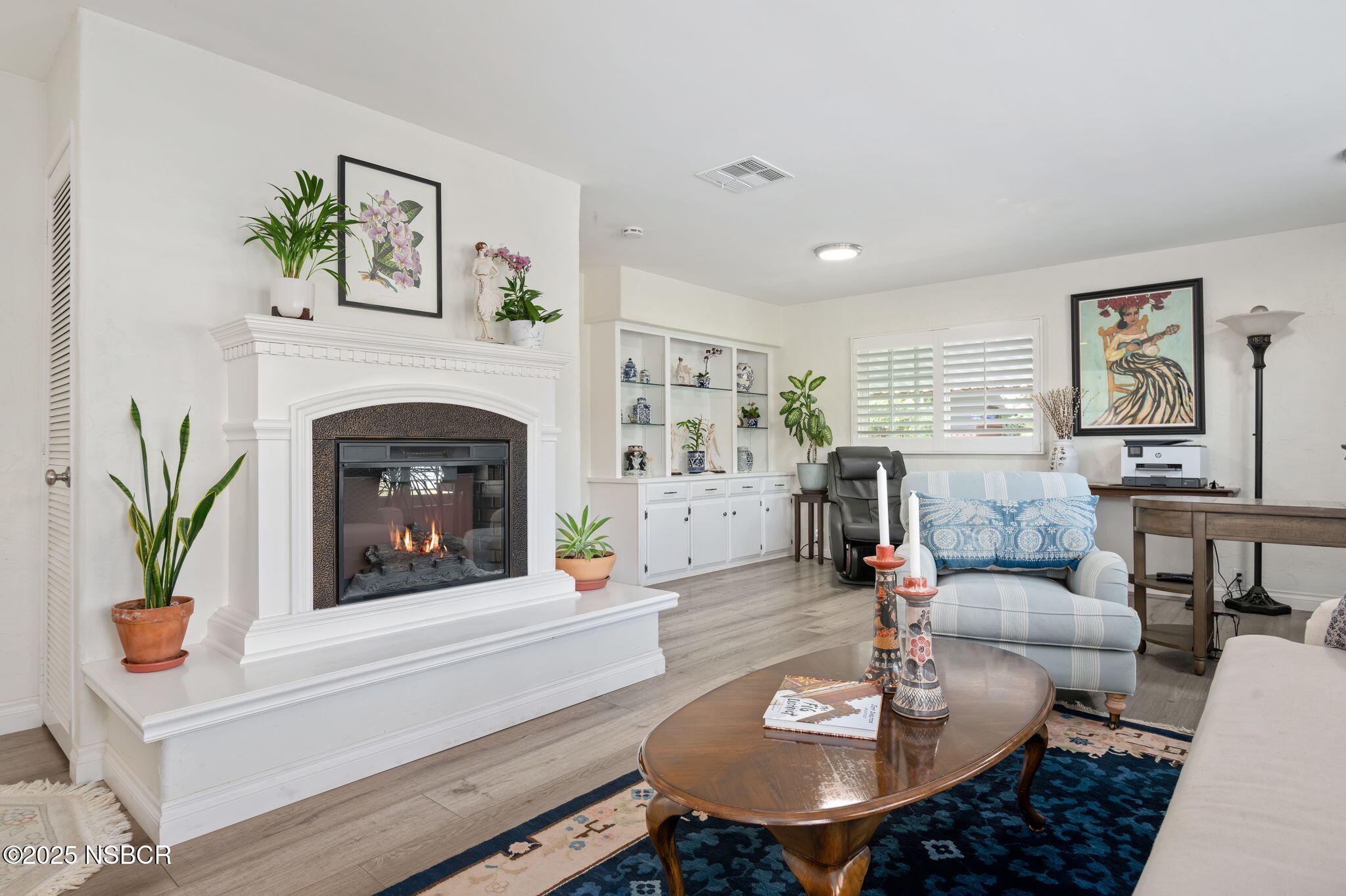 9 Paseo Del Rio Solvang, CA 93463 - Photo 11 of 32 a living room with furniture and a fireplace