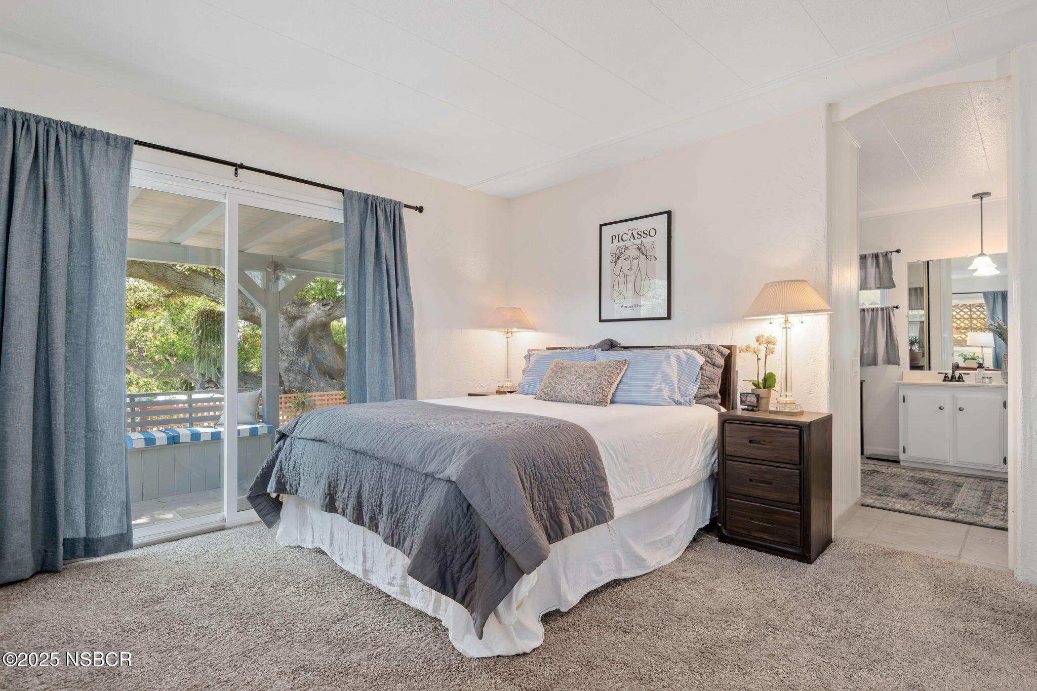 9 Paseo Del Rio Solvang, CA 93463 - Photo 13 of 32 a spacious bedroom with a bed and a window