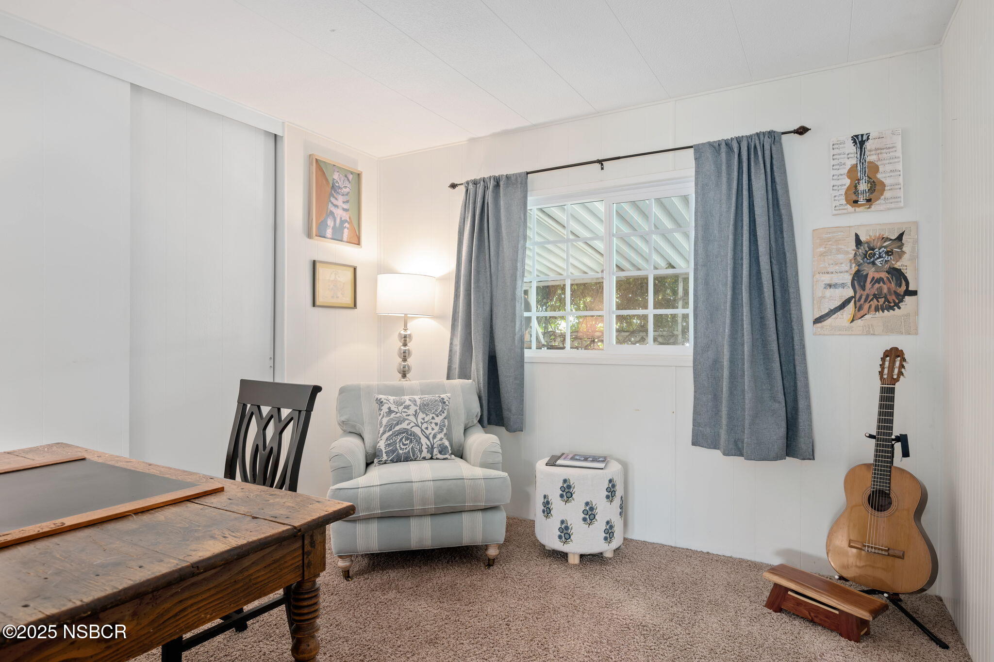 9 Paseo Del Rio Solvang, CA 93463 - Photo 17 of 32 a bedroom with furniture and a window