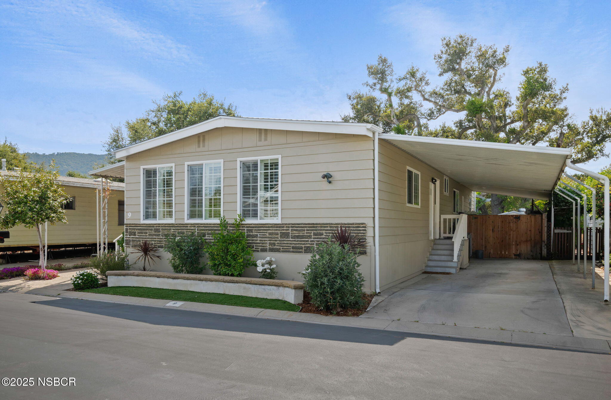 9 Paseo Del Rio Solvang, CA 93463 - Photo 2 of 32 a front view of a house with a yard