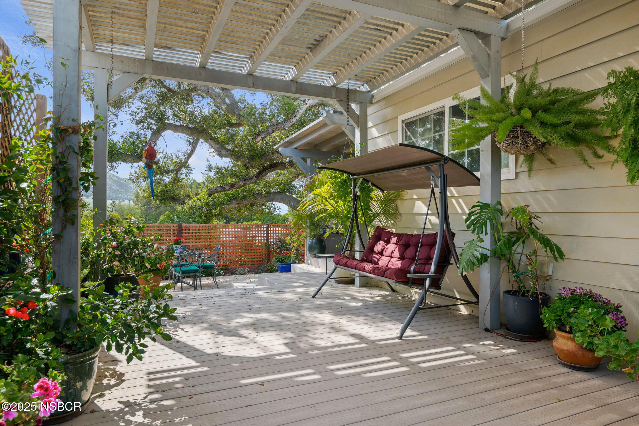 9 Paseo Del Rio Solvang, CA 93463 - Photo 23 of 32 a view of a tables and chairs under an umbrella