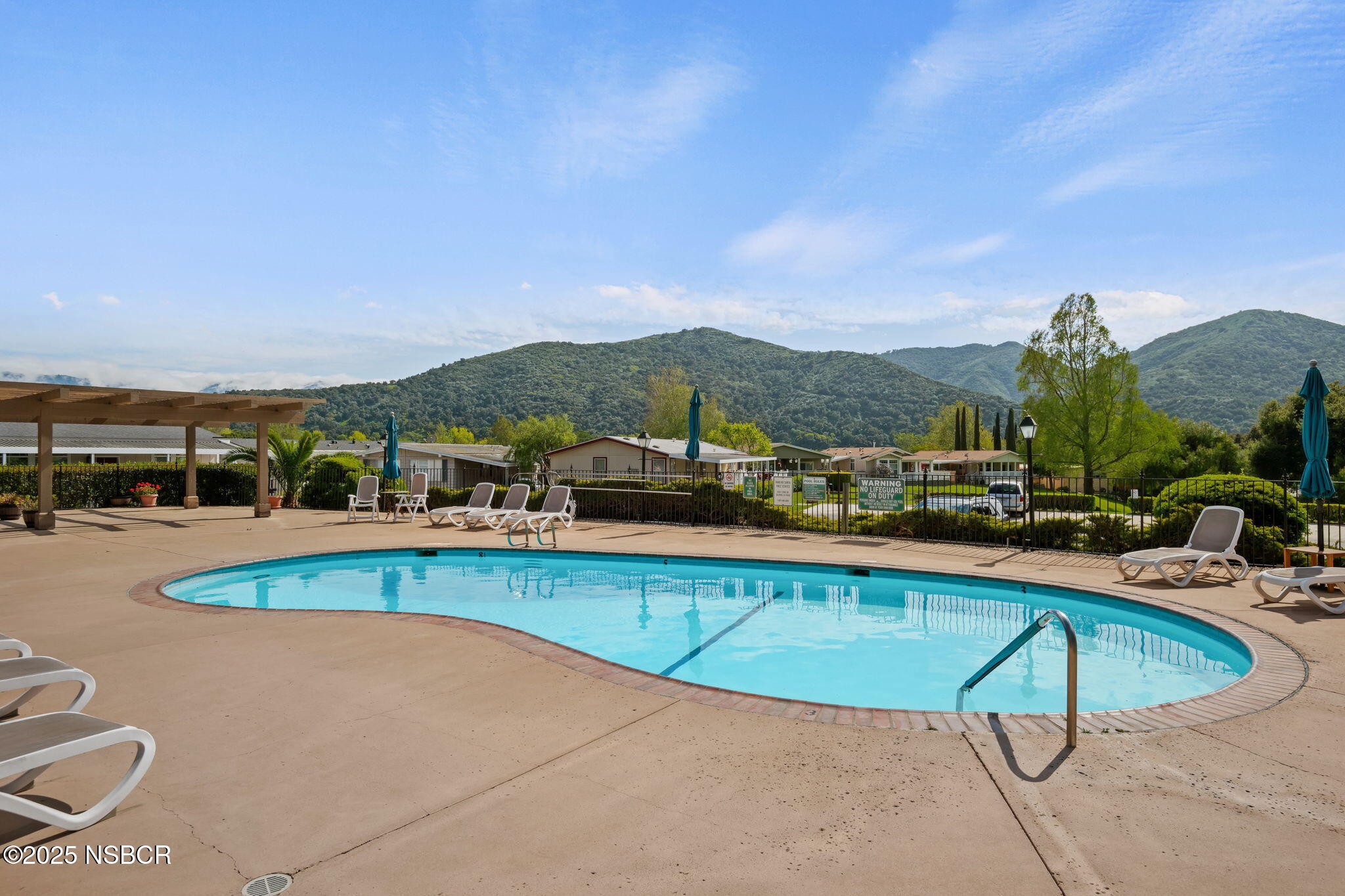 9 Paseo Del Rio Solvang, CA 93463 - Photo 27 of 32 a view of swimming pool with outdoor seating and city view