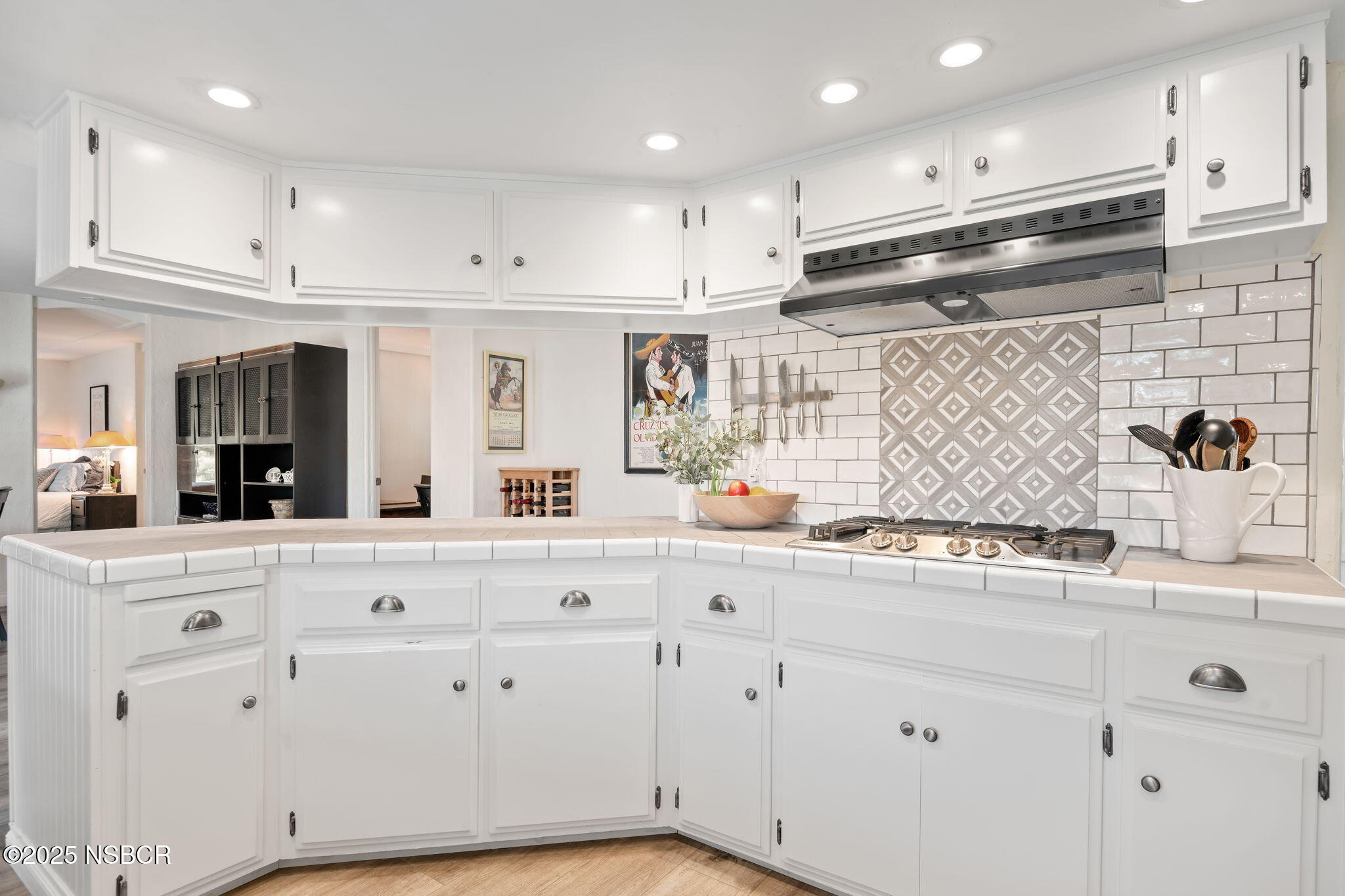 9 Paseo Del Rio Solvang, CA 93463 - Photo 5 of 32 a kitchen with granite countertop white cabinets white stainless steel appliances and white appliances