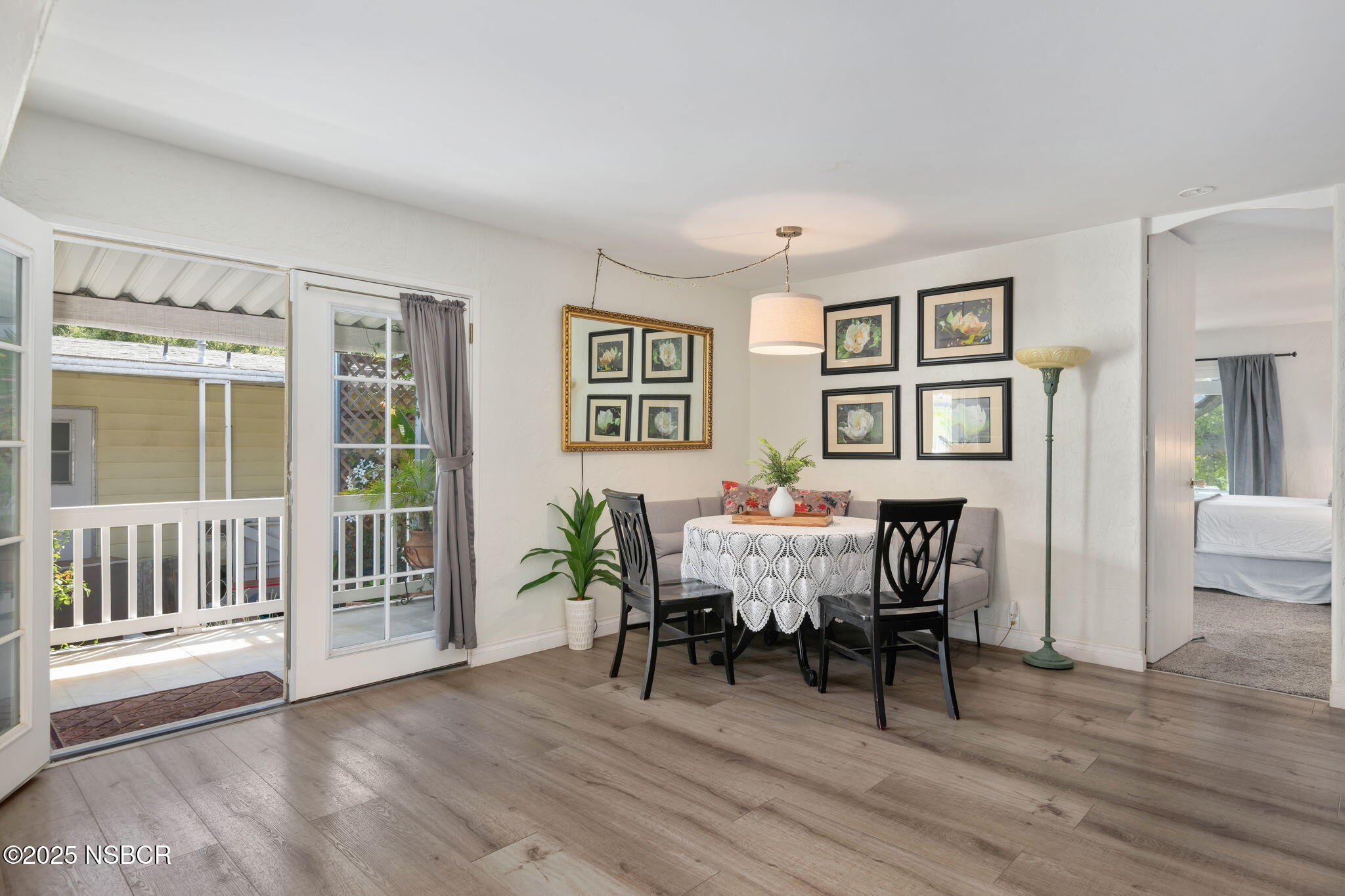 9 Paseo Del Rio Solvang, CA 93463 - Photo 7 of 32 a view of a dining room with furniture and wooden floor
