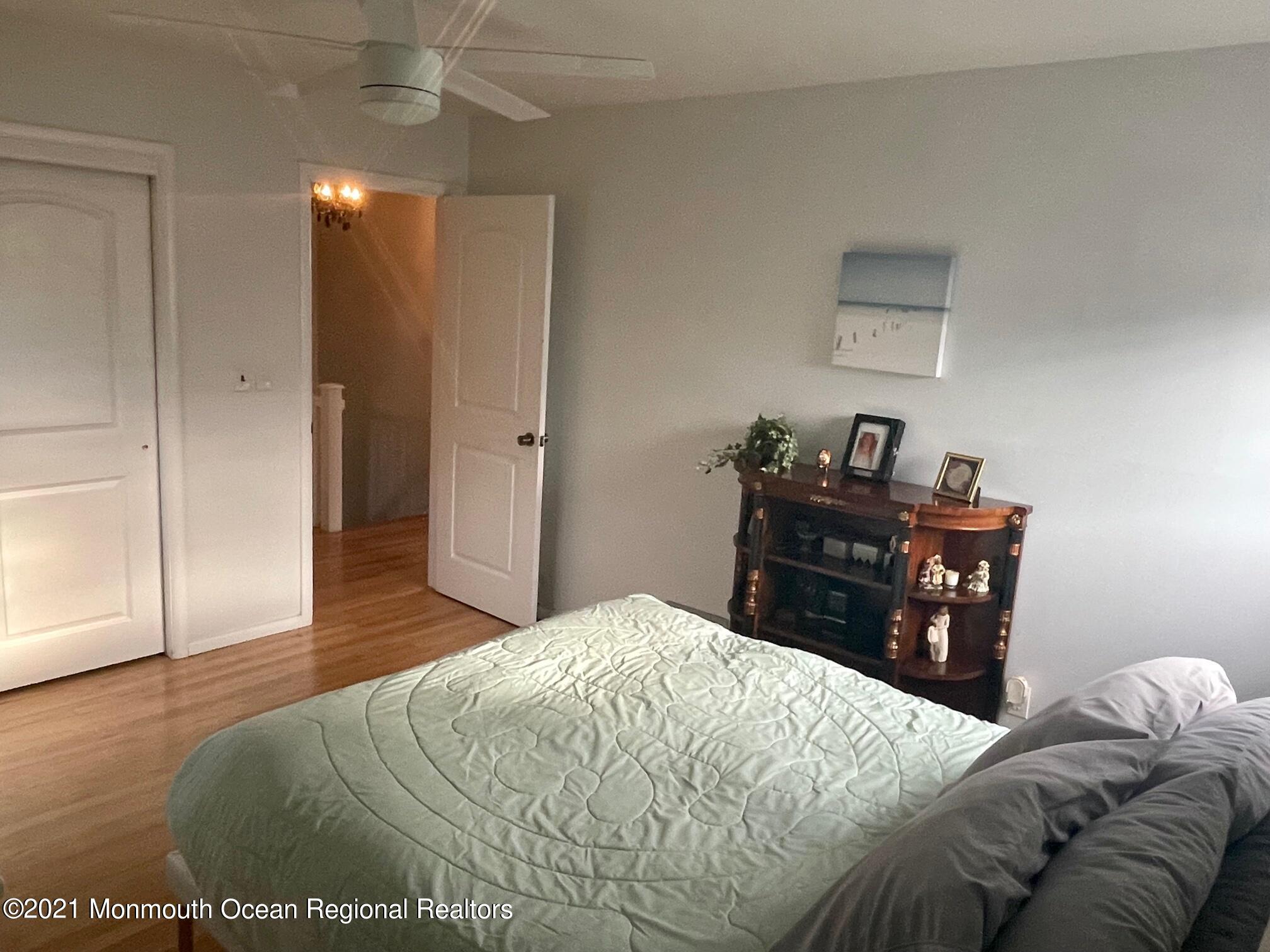 137 Crestview Drive Middletown, NJ 07748 - Photo 12 of 18 a bedroom with a bed and a dresser
