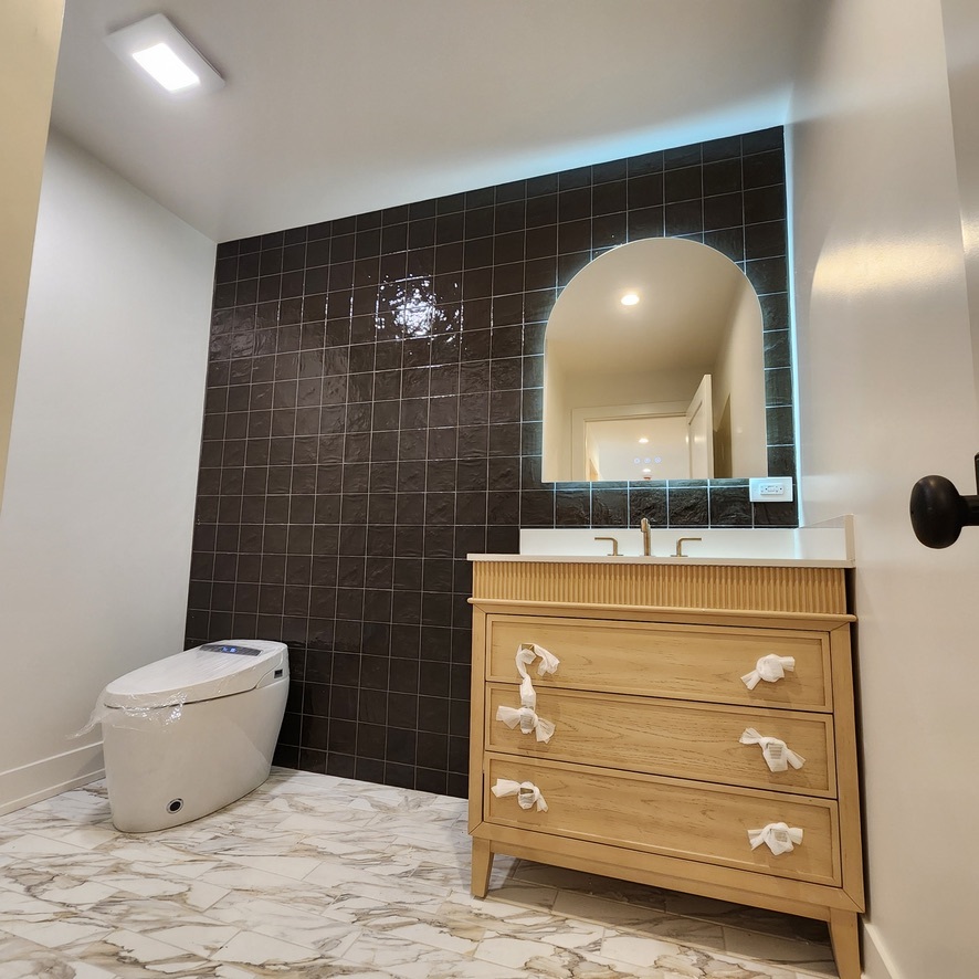 1975 Sunset Ridge Road Northfield, IL 60093 - Photo 17 of 21 a bathroom with a sink and a mirror