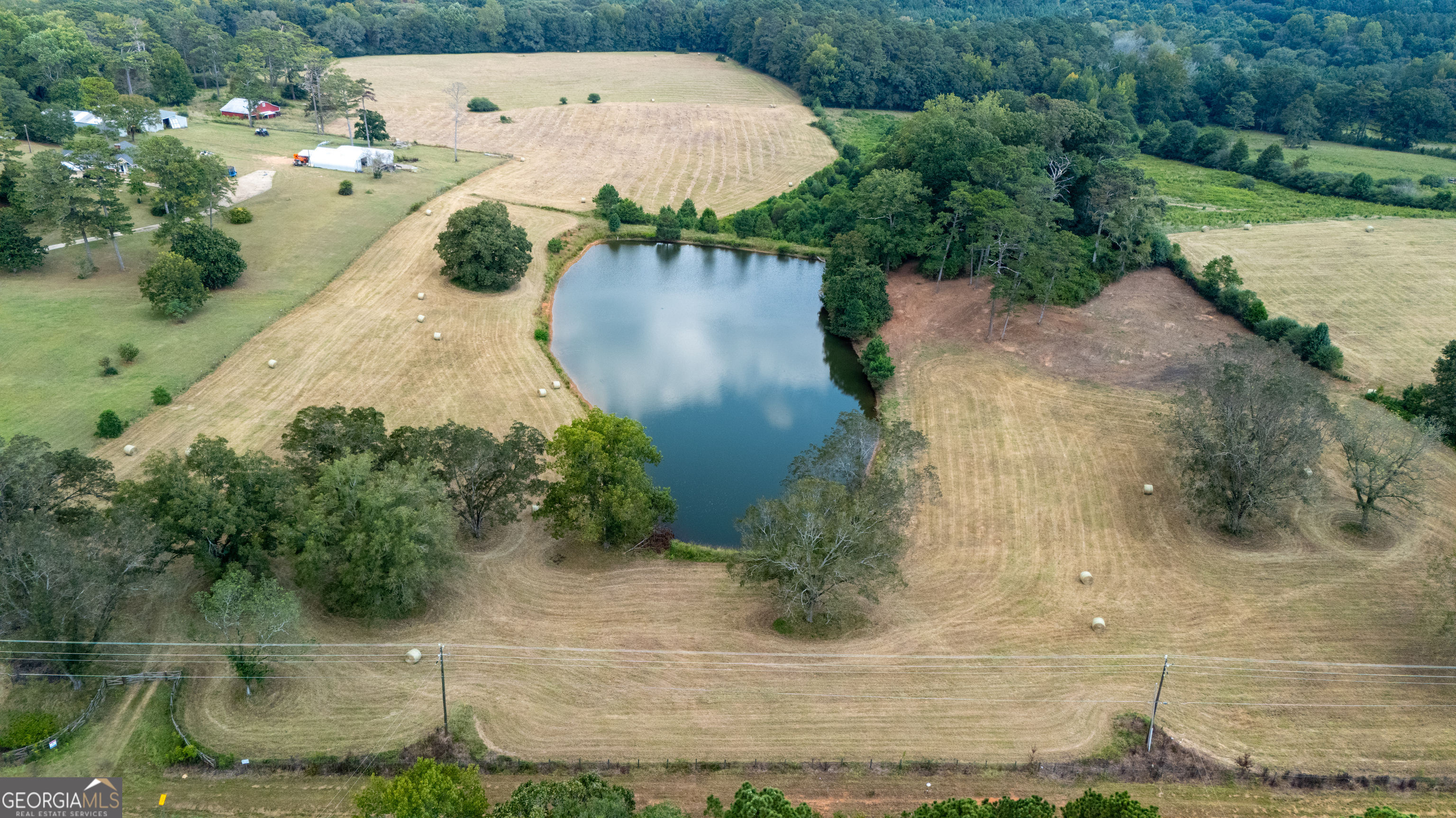 0 Whitesville Road LaGrange, GA 30240 - Photo 16 of 21 an aerial view of a house with a yard and trees