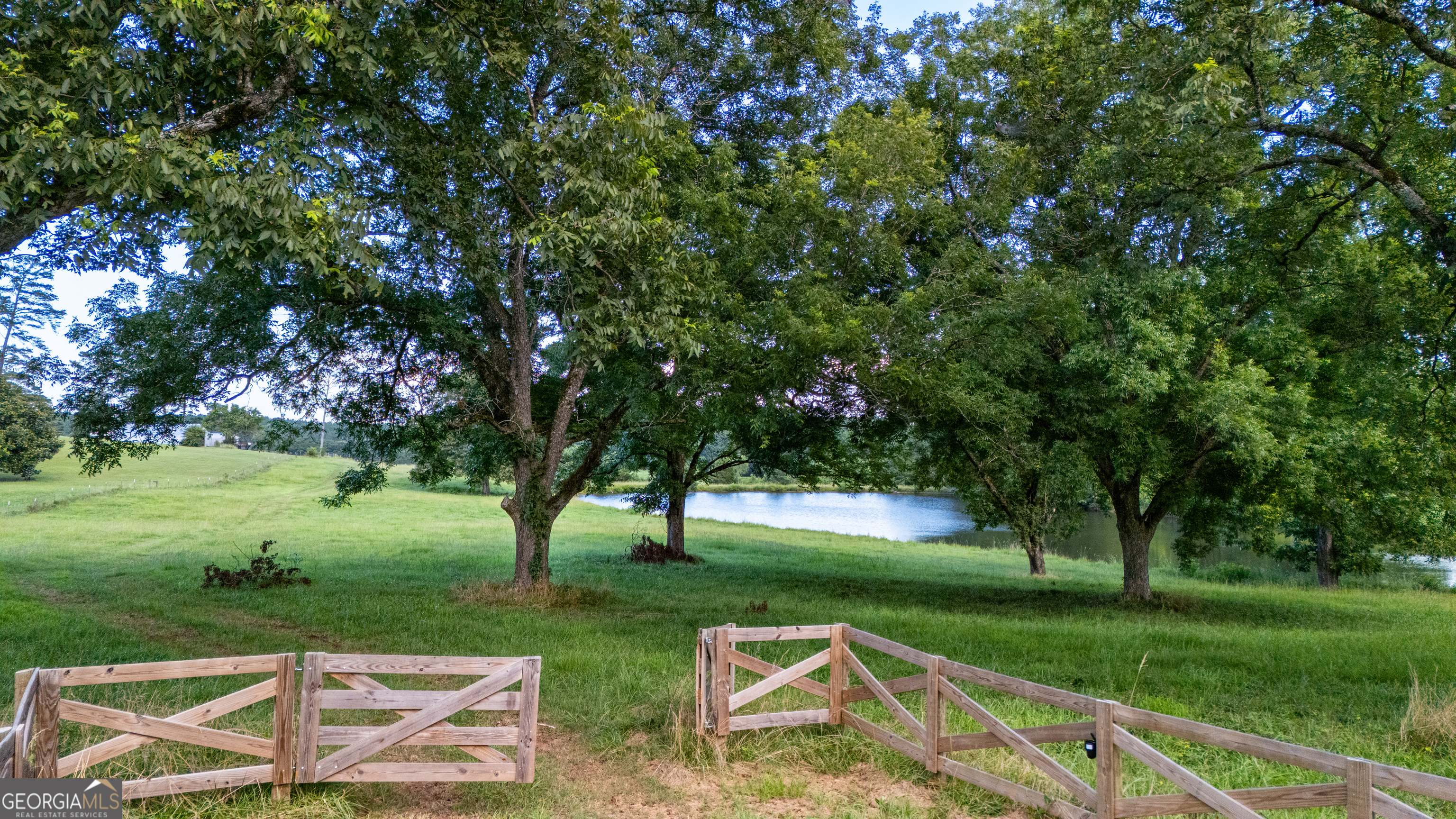 0 Whitesville Road LaGrange, GA 30240 - Photo 3 of 21 a view of a table and chairs in the garden
