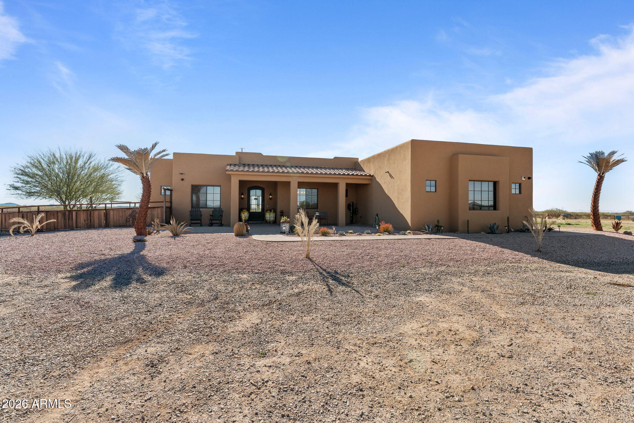 46629 West Luray Road Wickenburg, AZ 85390 - Photo 1 of 64 a view of a house with a backyard