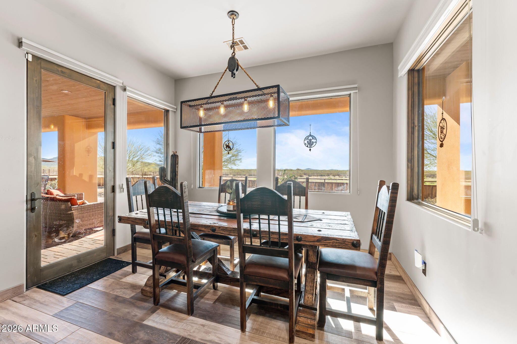 46629 West Luray Road Wickenburg, AZ 85390 - Photo 28 of 64 a view of a dining room with furniture window and outside view