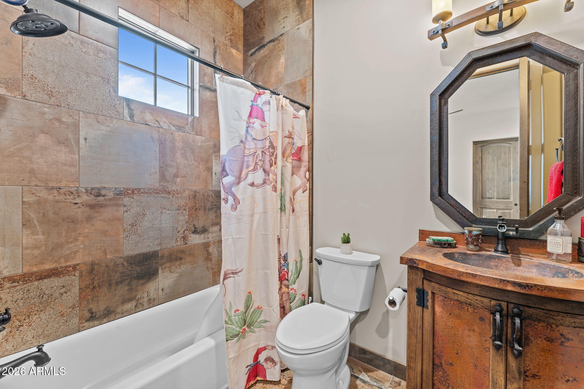 46629 West Luray Road Wickenburg, AZ 85390 - Photo 31 of 64 a bathroom with a granite countertop toilet sink and a bathtub