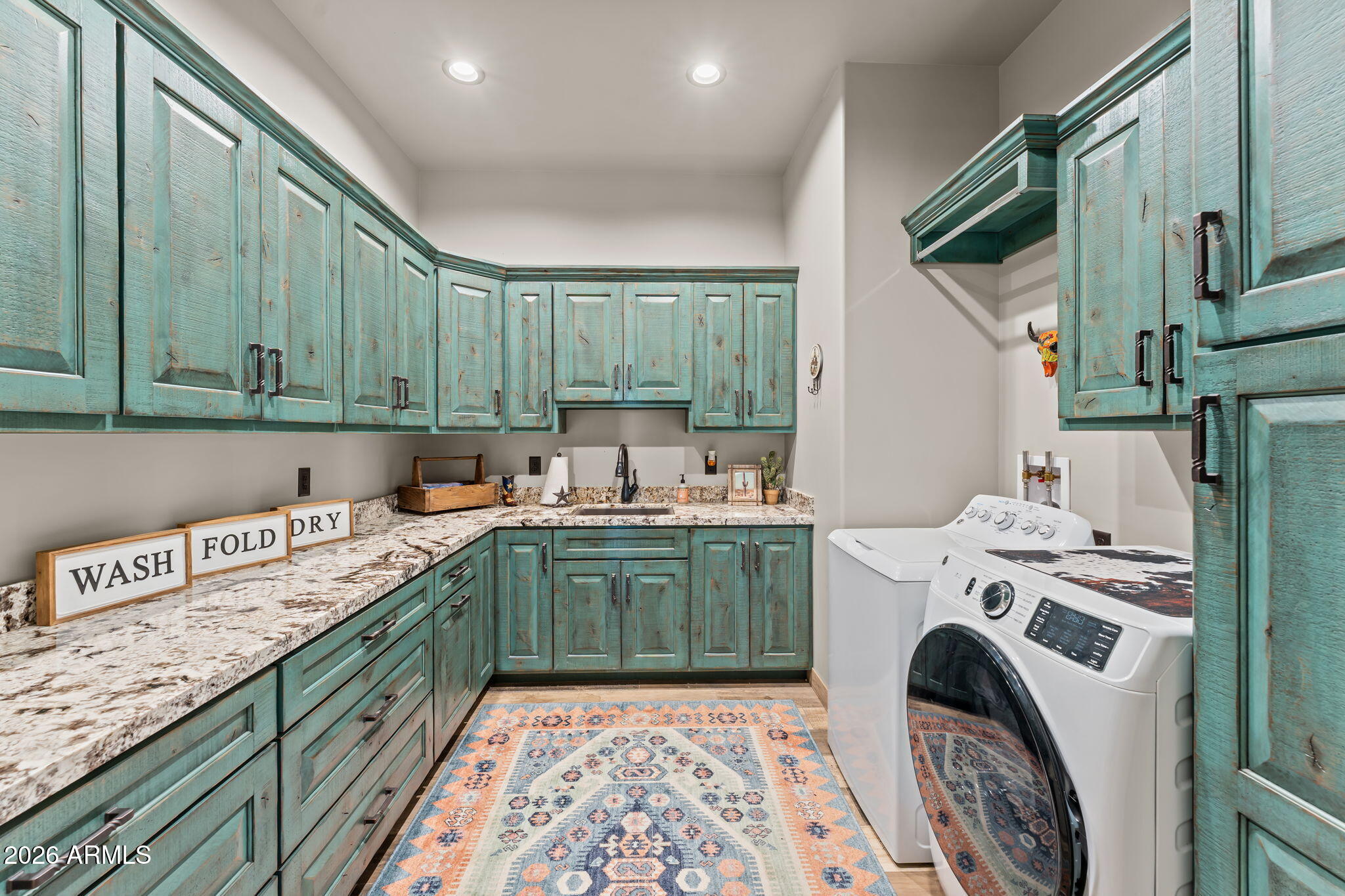46629 West Luray Road Wickenburg, AZ 85390 - Photo 37 of 64 a utility room with sink dryer and washer