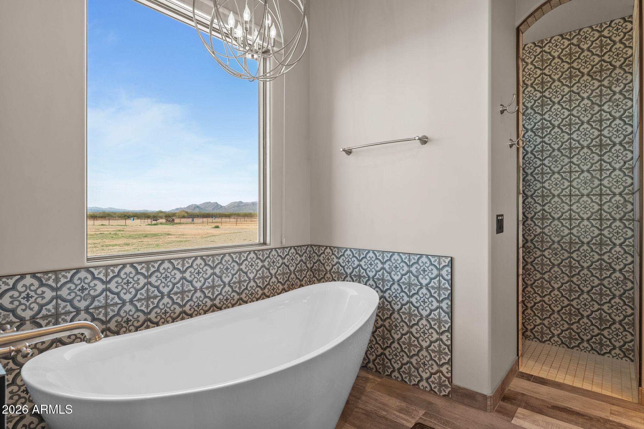 46629 West Luray Road Wickenburg, AZ 85390 - Photo 40 of 64 a bathroom with a bathtub and shower