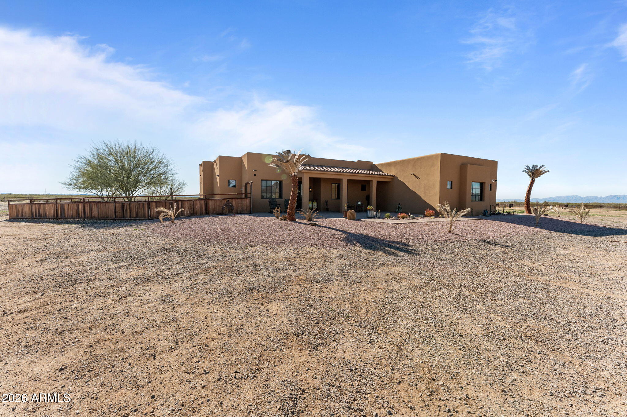 46629 West Luray Road Wickenburg, AZ 85390 - Photo 51 of 64 a view of a house with a backyard