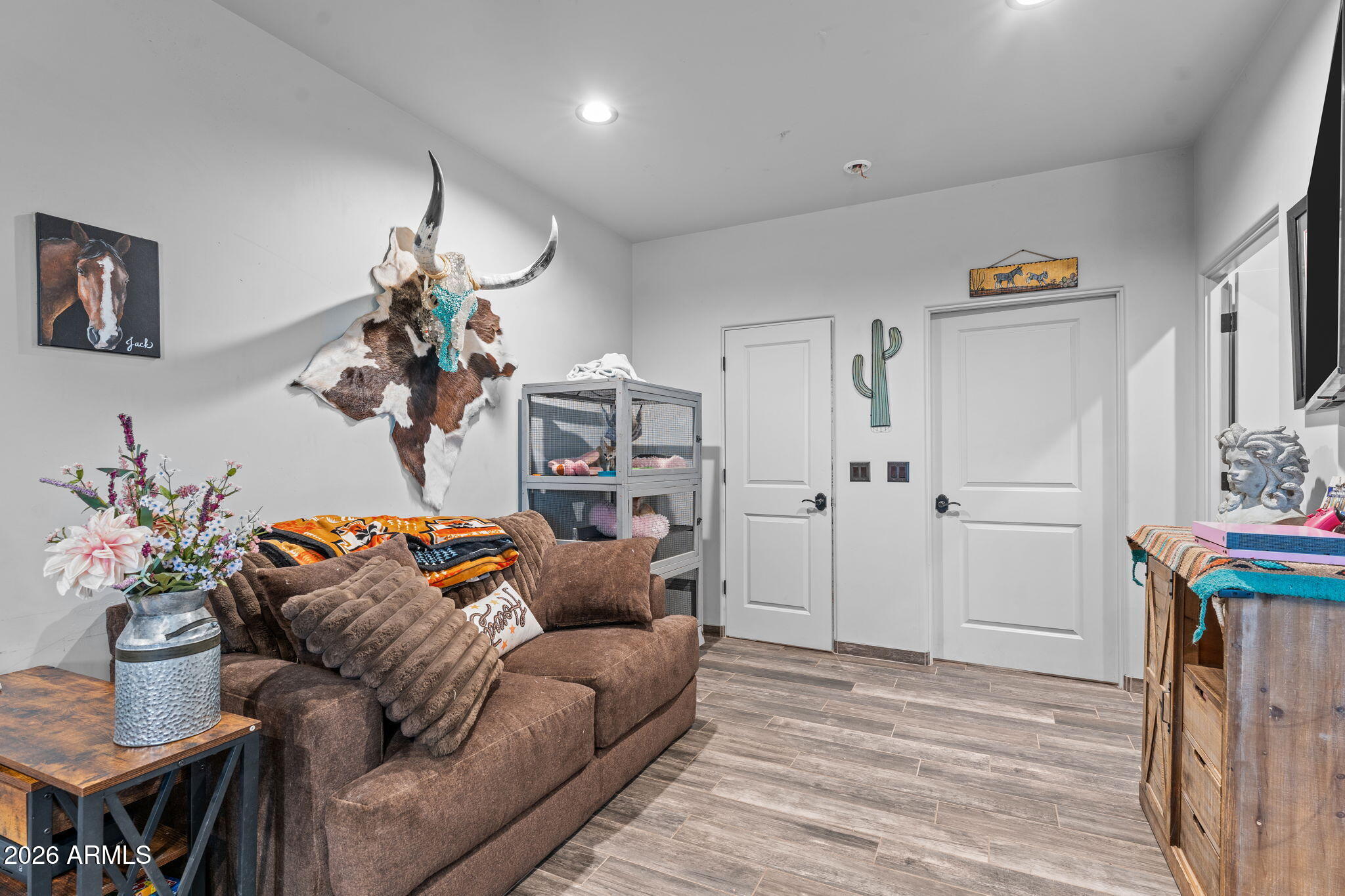 46629 West Luray Road Wickenburg, AZ 85390 - Photo 61 of 64 a living room with furniture and flowers