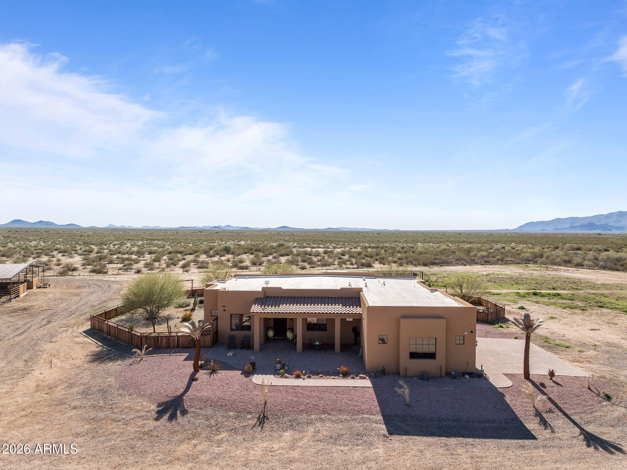 46629 West Luray Road Wickenburg, AZ 85390 - Photo 10 of 64 a view of a terrace with lawn chairs