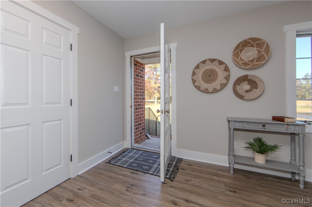 8717 Pole Run Road Disputanta, VA 23842 - Photo 7 of 42 Entryway with hardwood / wood-style floors