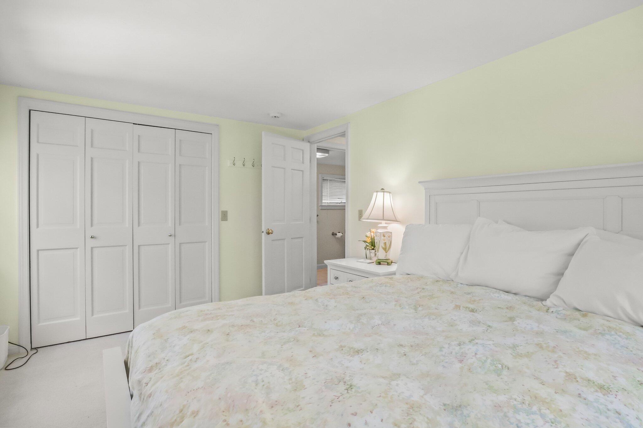 435 Huckins Neck Road Centerville, MA 02632 - Photo 24 of 42 a large white bed in a white room