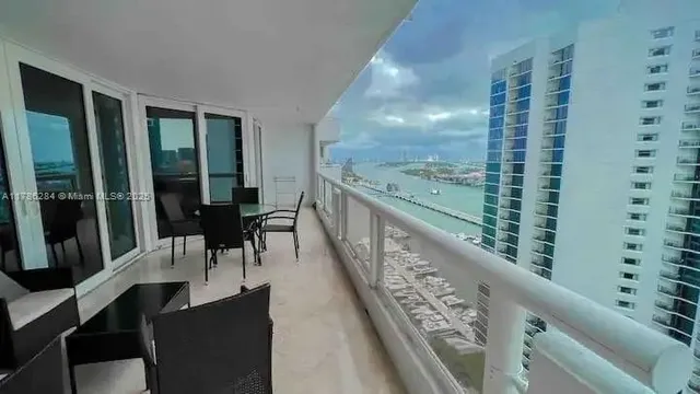 a view of balcony with furniture