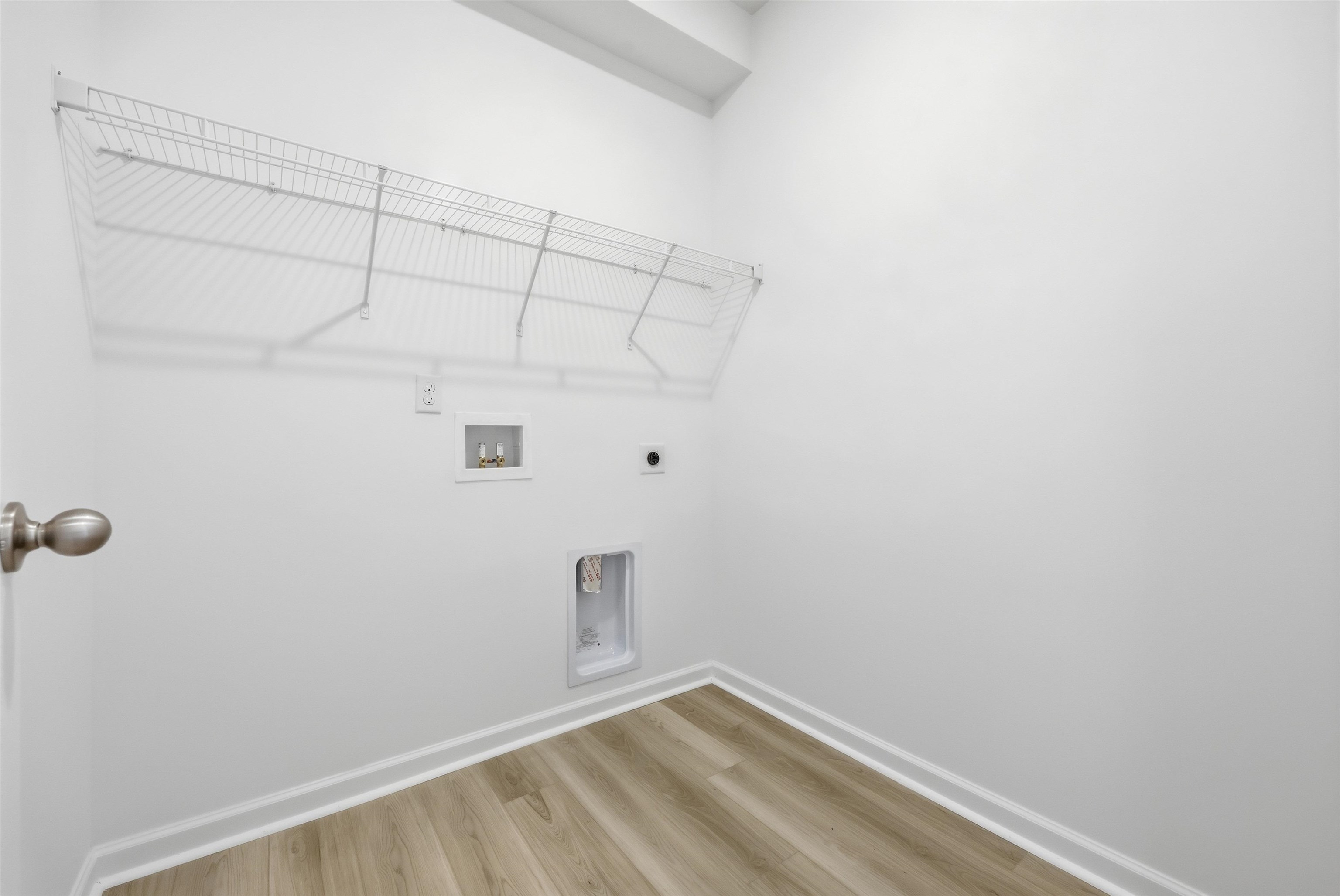 142 River Birch Drive Loris, SC 29569 - Photo 18 of 39 Laundry room with wood finished floors, electric dryer hookup, and washer hookup