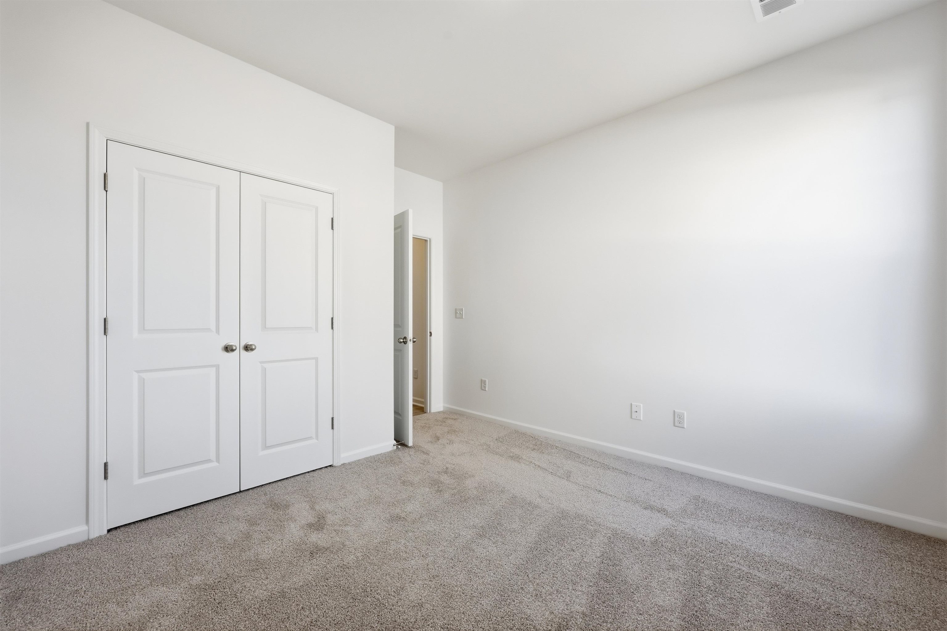 142 River Birch Drive Loris, SC 29569 - Photo 20 of 39 Unfurnished bedroom featuring carpet and a closet