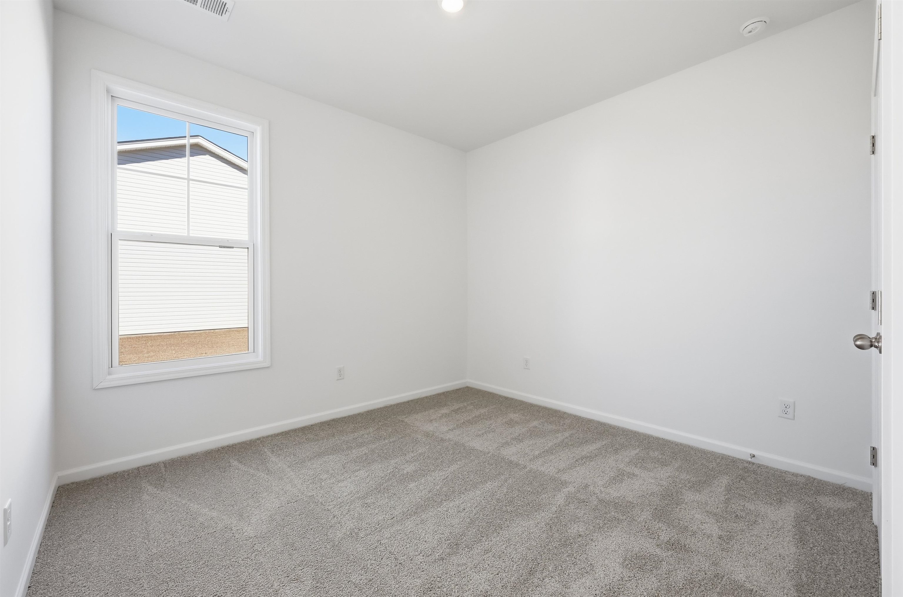 142 River Birch Drive Loris, SC 29569 - Photo 26 of 39 Unfurnished room featuring carpet flooring and baseboards