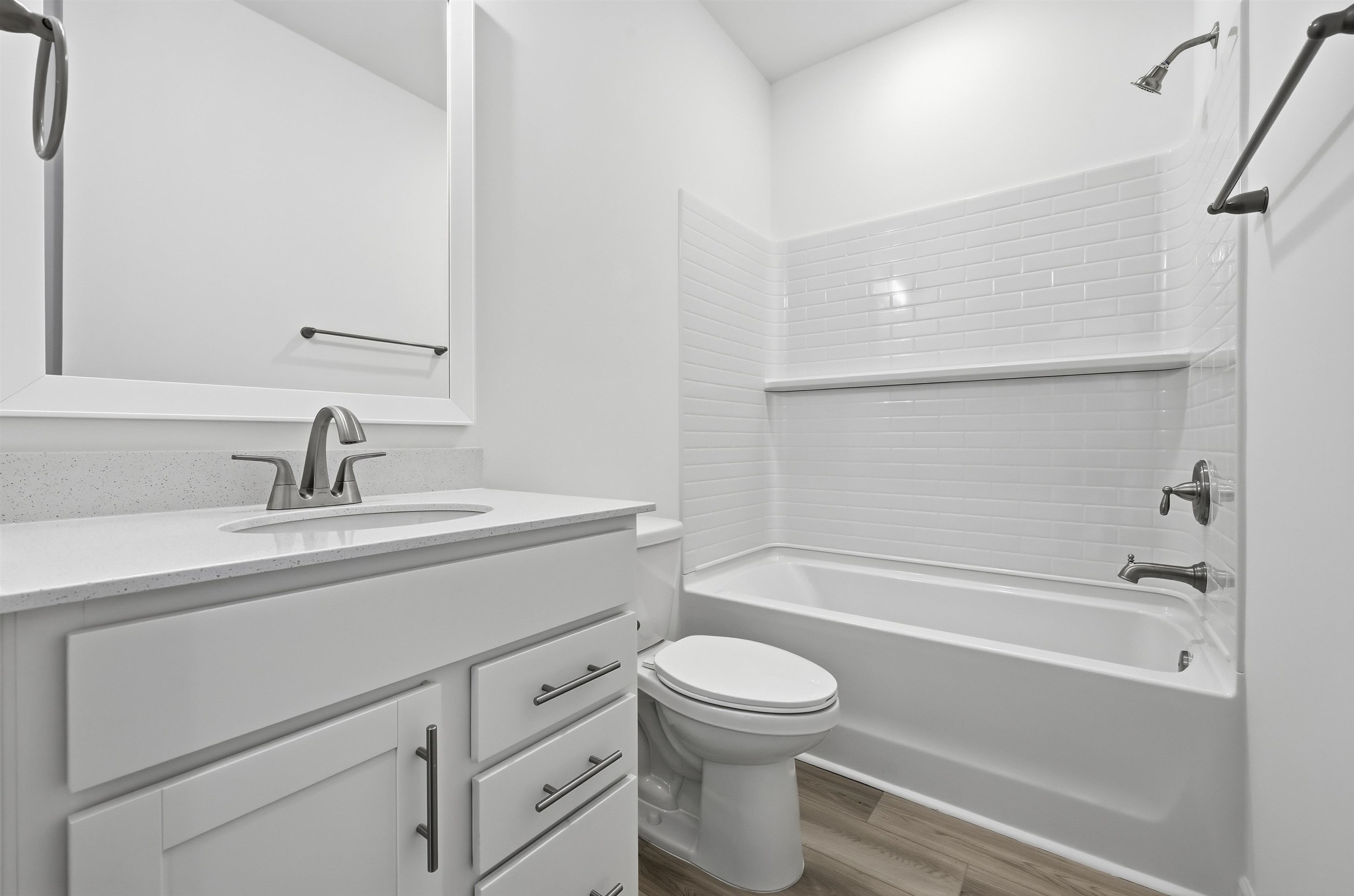 142 River Birch Drive Loris, SC 29569 - Photo 28 of 39 Full bath featuring shower / bathtub combination, vanity, and wood finished floors