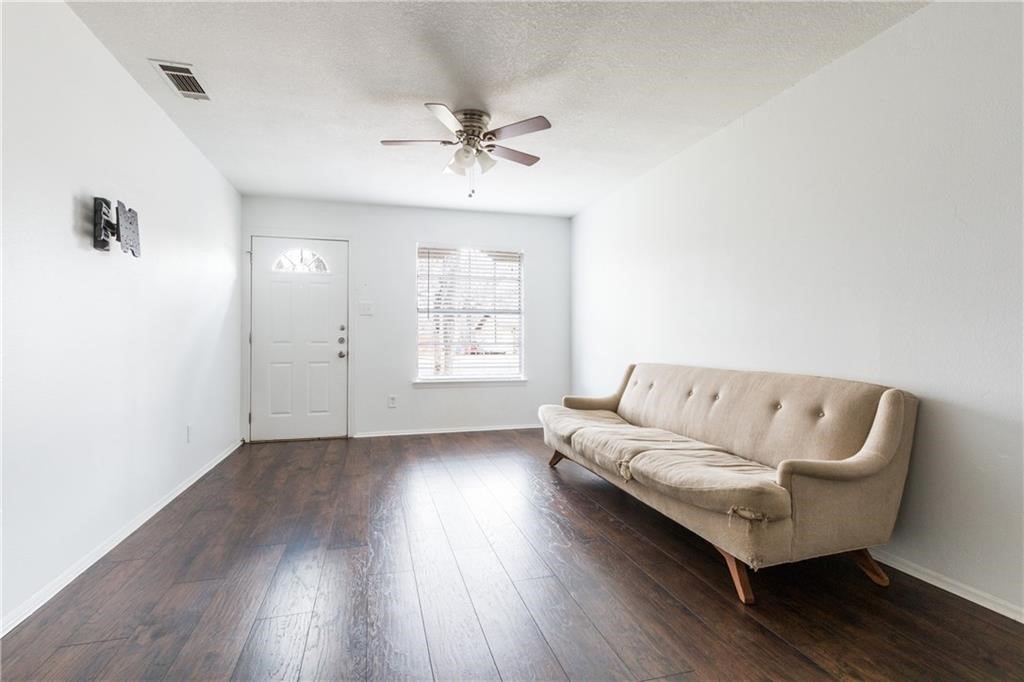 6005 Hogan Avenue Austin, TX 78741 - Photo 4 of 19 a living room with furniture and a window
