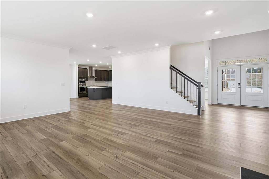 259 Deer Valley Run Canton, GA 30115 - Photo 8 of 25 a view of a kitchen with a sink and a stove top oven