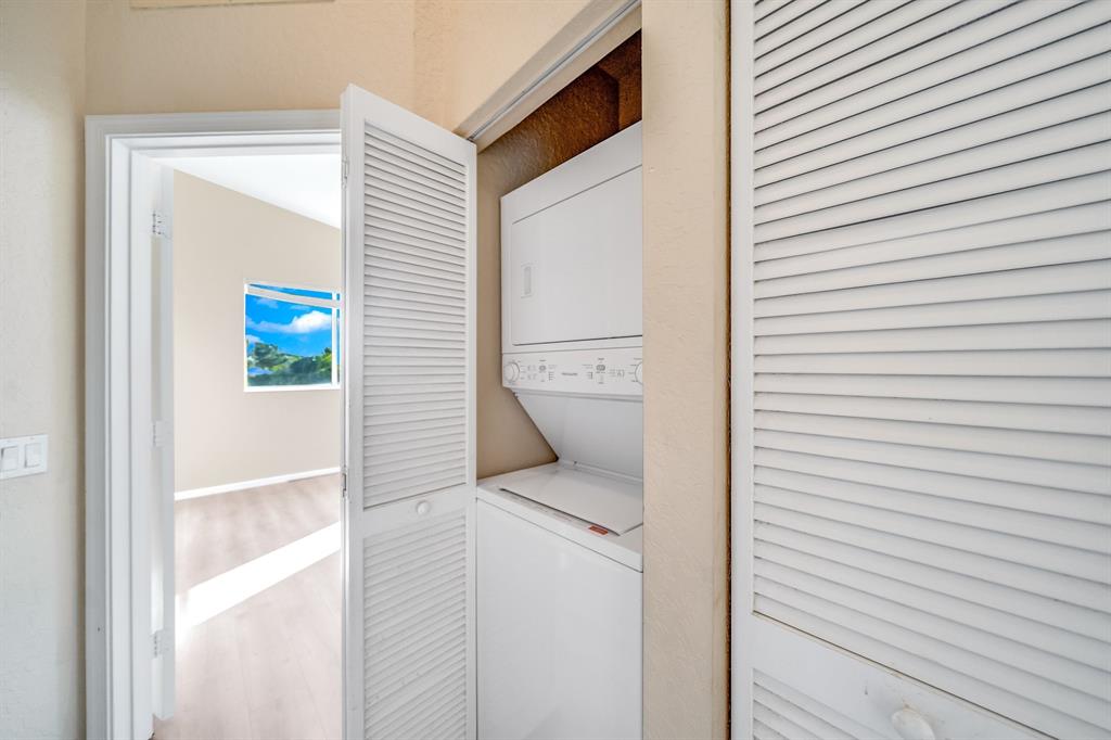 3141 Laurel Ridge Circle Riviera Beach, FL 33404 - Photo 17 of 28 a close view of a utility room with washer and dryer