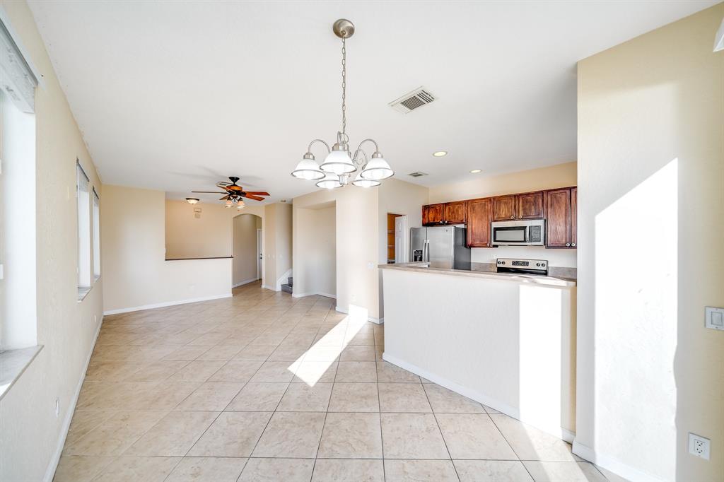 3141 Laurel Ridge Circle Riviera Beach, FL 33404 - Photo 8 of 28 a view of a kitchen with cabinet and dishwasher