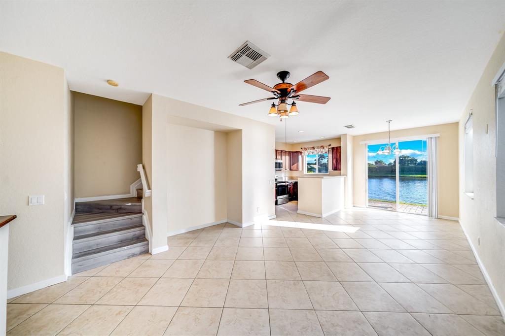 3141 Laurel Ridge Circle Riviera Beach, FL 33404 - Photo 9 of 28 a view of an entryway with wooden floor