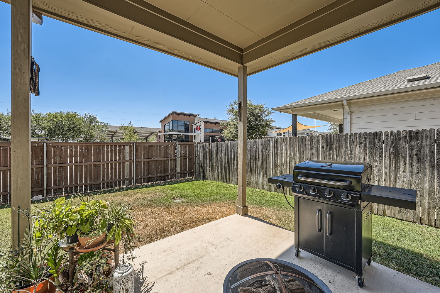 1205 Falconer Way, Unit 91 Austin, TX 78748 - Photo 36 of 39 Fenced backyard featuring a patio area