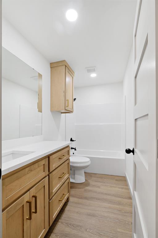 728 County Road Powderly, TX 75473 - Photo 21 of 24 a bathroom with a sink a toilet and shower