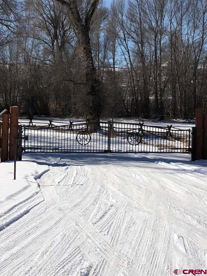 433 Meadow View Trail Gunnison, CO 81230 - Photo 5 of 13 a view of backyard and deck