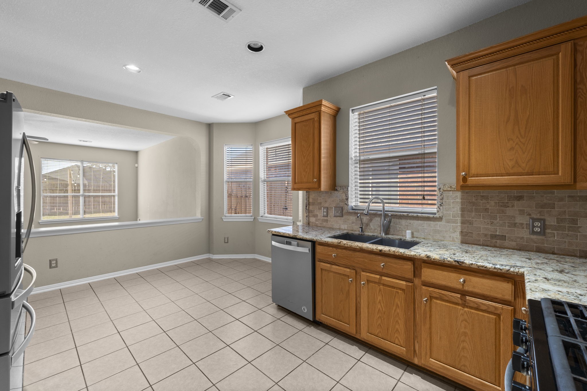 19327 Dickson Park Drive Spring, TX 77373 - Photo 13 of 43 The breakfast area is situated between the Kitchen and the Family room so conversation flows easily between these rooms when preparing dinner or entertaining.