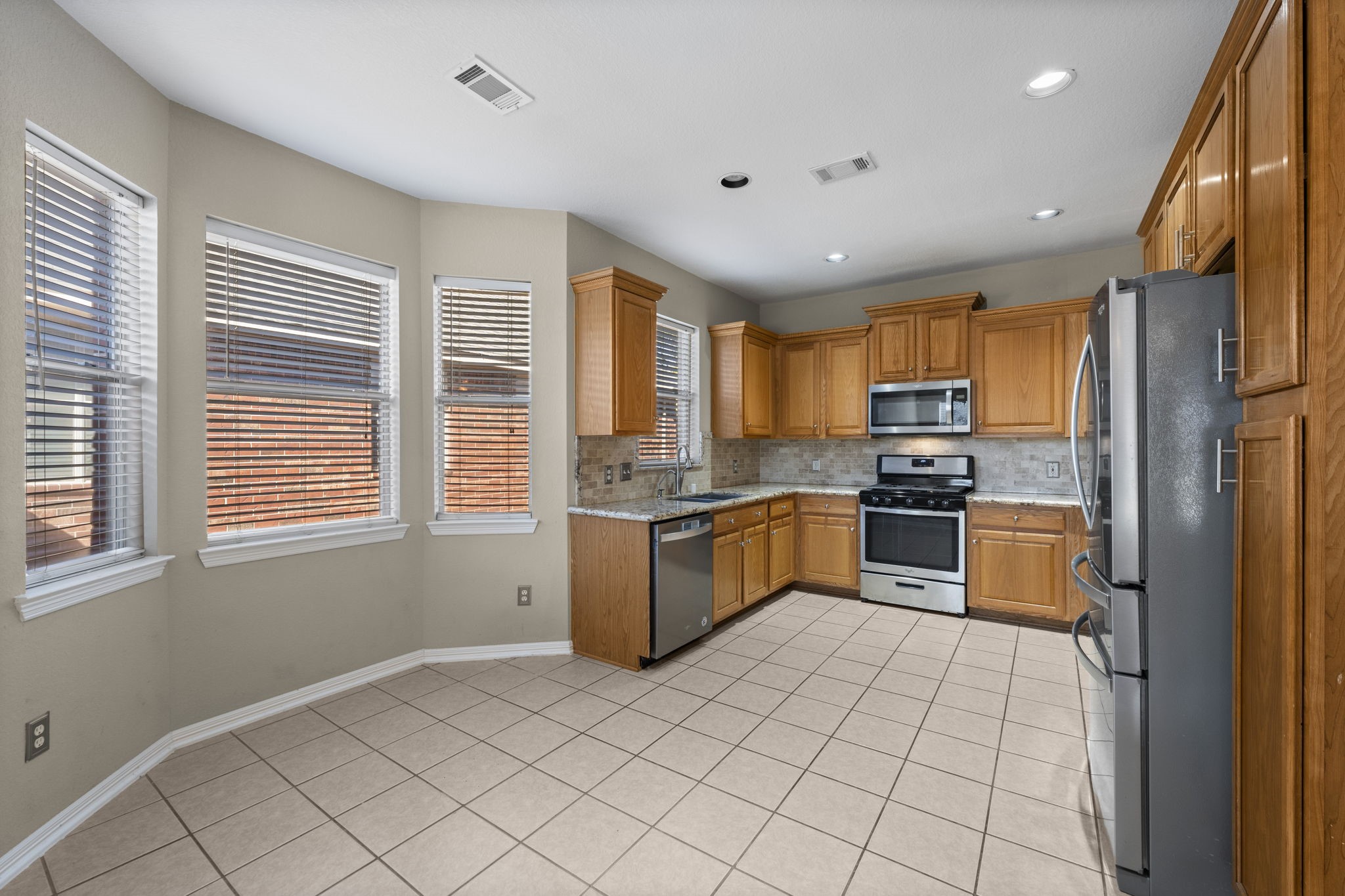 19327 Dickson Park Drive Spring, TX 77373 - Photo 15 of 43 Another view of the Breakfast room looking toward the Kitchen.