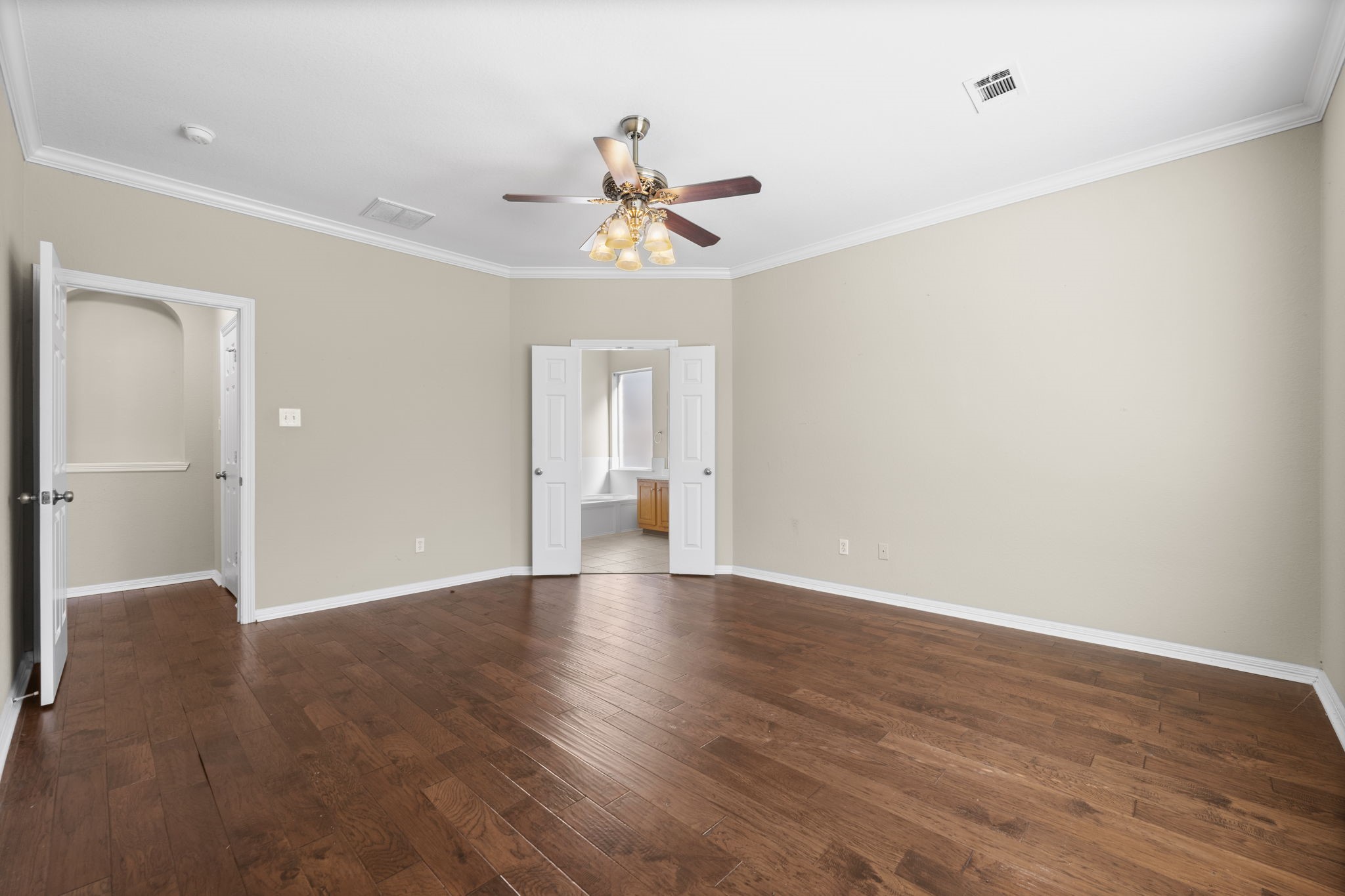 19327 Dickson Park Drive Spring, TX 77373 - Photo 17 of 43 There is plenty of room in this oversized room for any furniture combination. Note the hallway art niche outside the main door and the majestic double door entry to the en-suite bathroom!