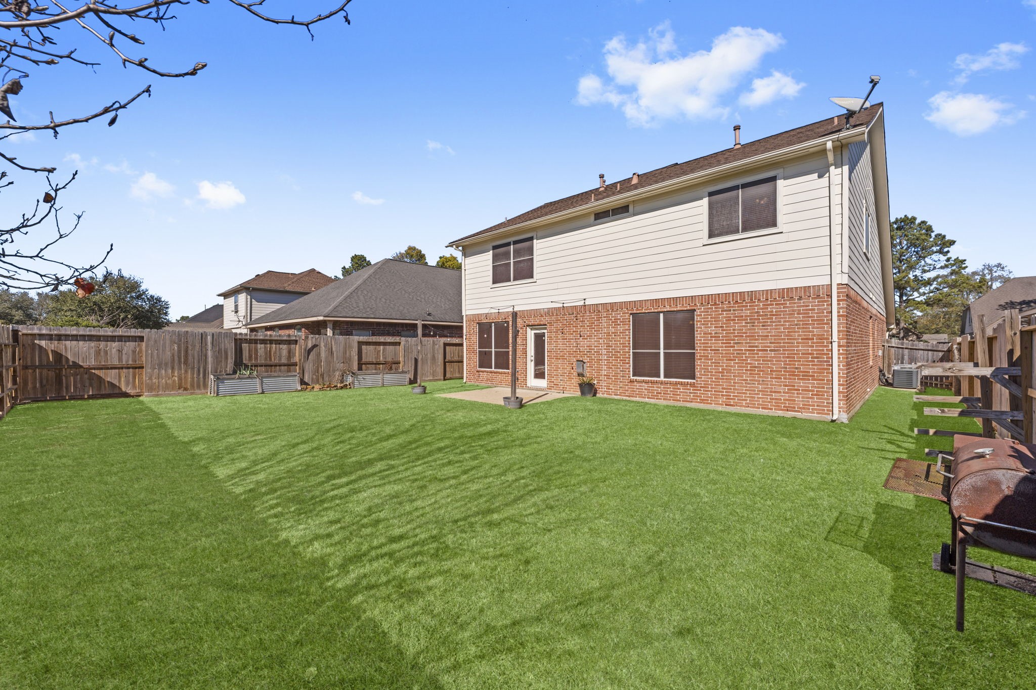 19327 Dickson Park Drive Spring, TX 77373 - Photo 39 of 43 Plenty of room for running, playing, or lounging. Or build your dream pool! Along the side fence are large containers for gardening.