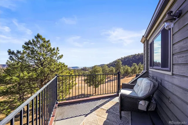 a aerial view of a house with a yard