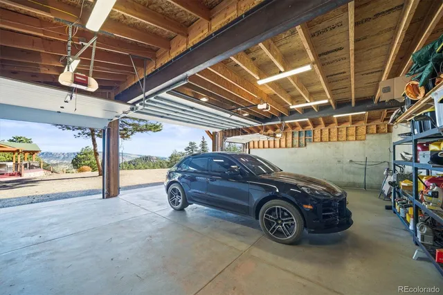 a view of a house with a snow on the road
