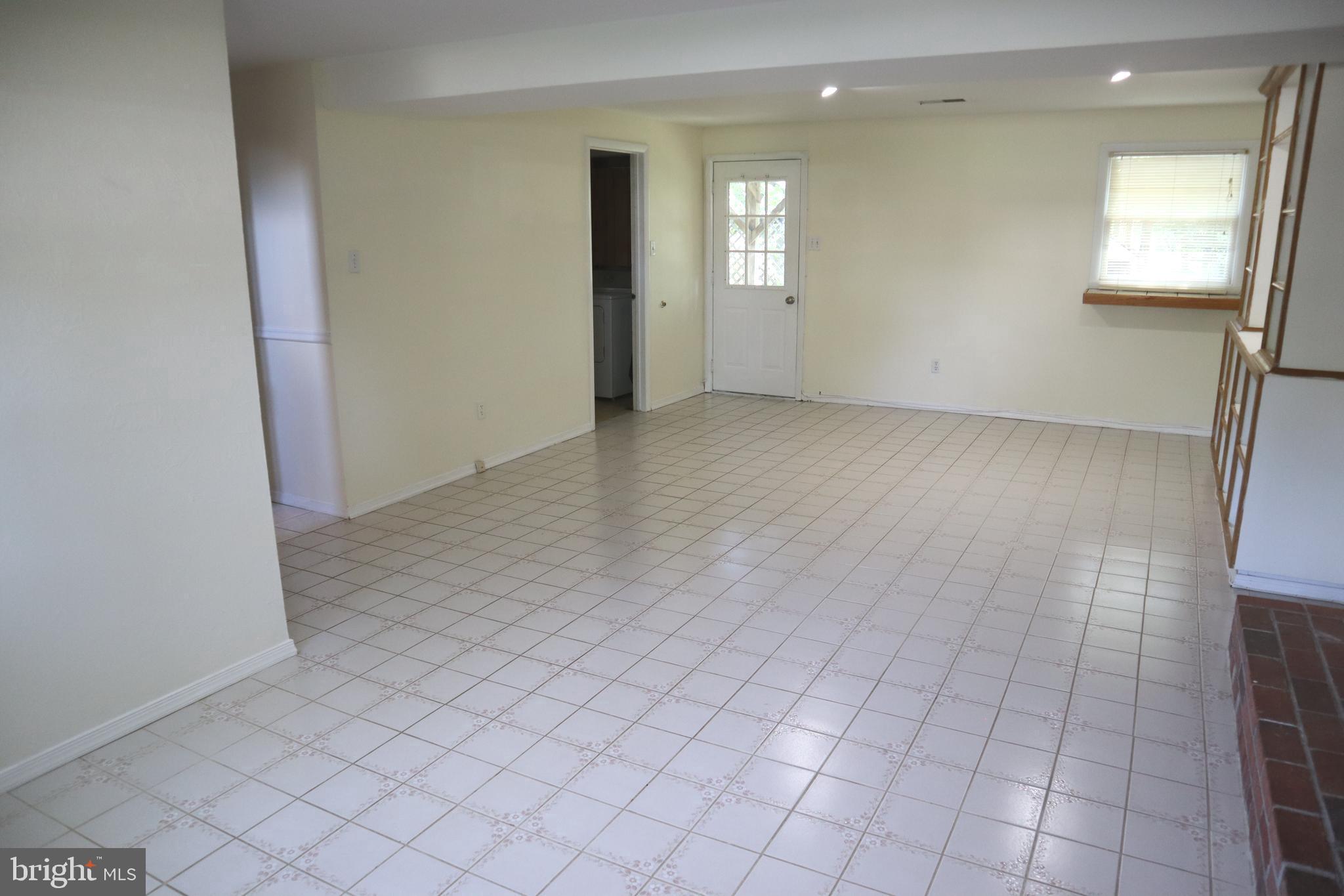 8501 Fairburn Drive Springfield, VA 22152 - Photo 15 of 30 an empty room with windows