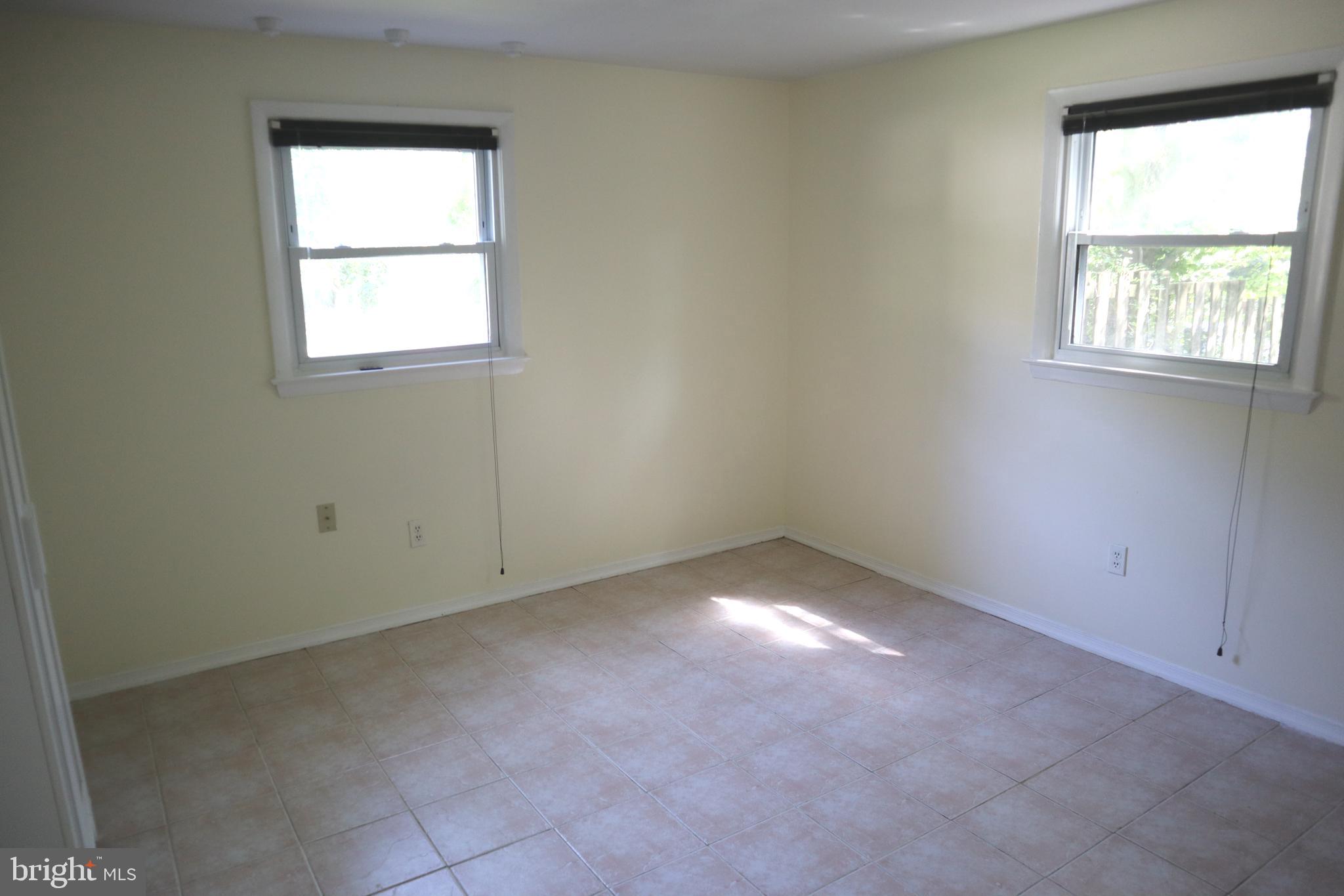 8501 Fairburn Drive Springfield, VA 22152 - Photo 16 of 30 an empty room with a window