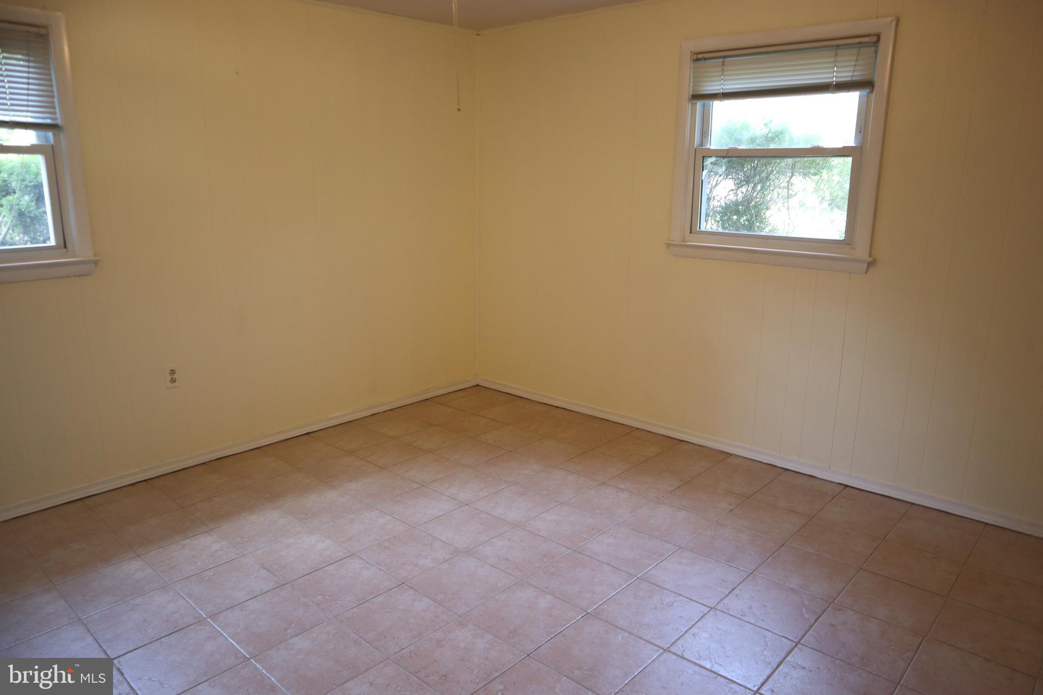 8501 Fairburn Drive Springfield, VA 22152 - Photo 18 of 30 an empty room with a window