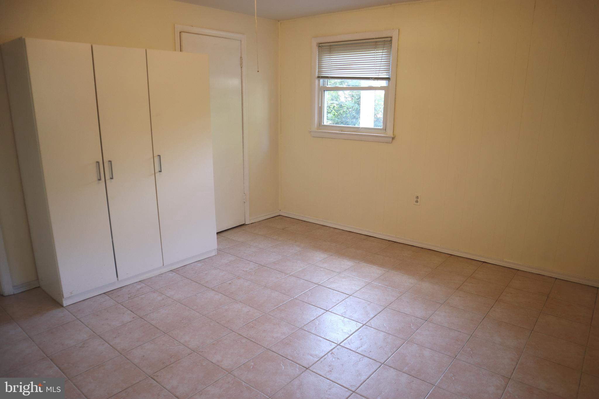 8501 Fairburn Drive Springfield, VA 22152 - Photo 19 of 30 a view of an empty room with a window