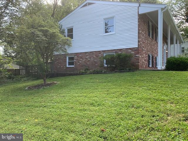 8501 Fairburn Drive Springfield, VA 22152 - Photo 2 of 30 a view of a backyard of the house