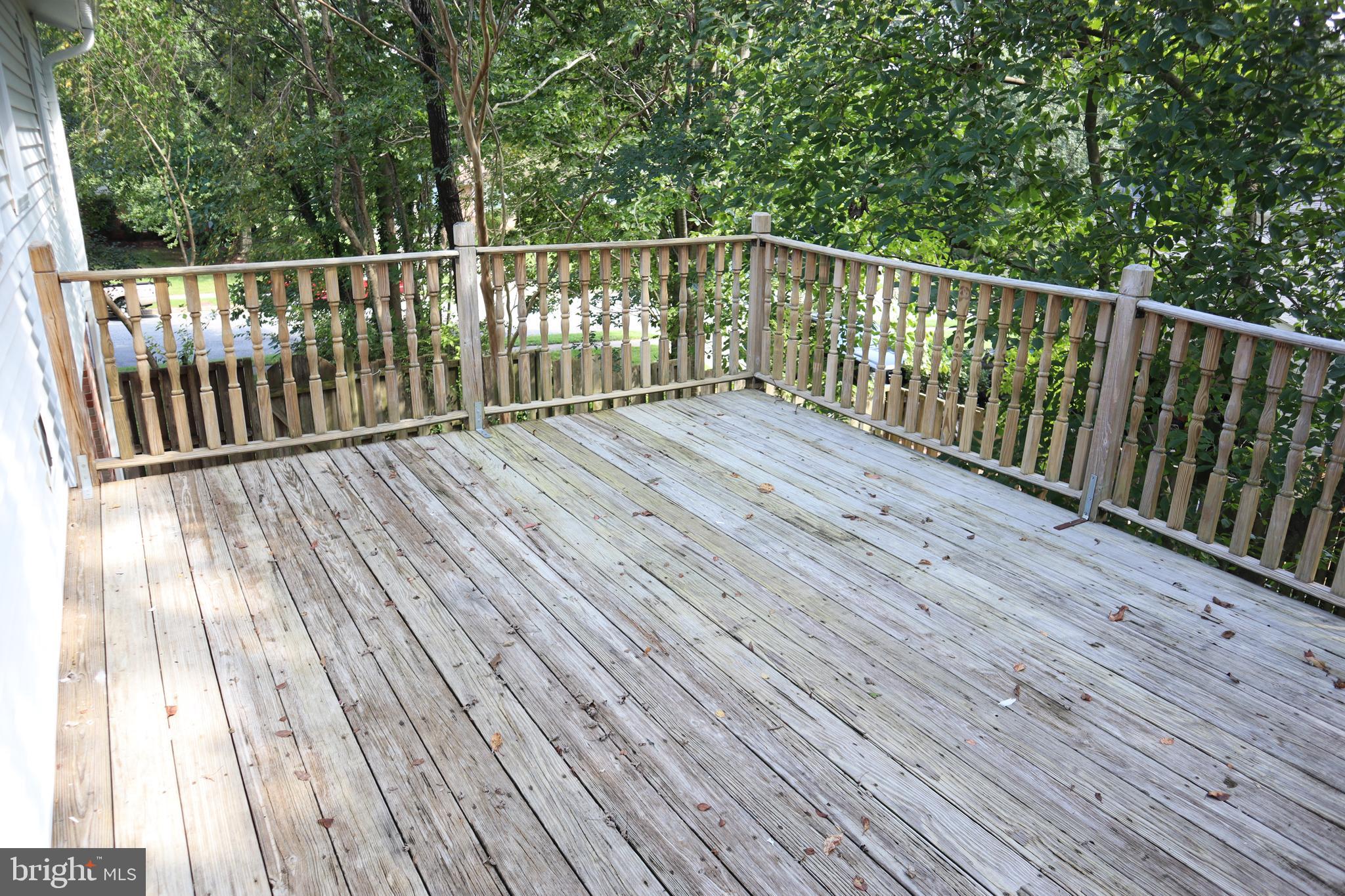 8501 Fairburn Drive Springfield, VA 22152 - Photo 22 of 30 a view of balcony with wooden floor