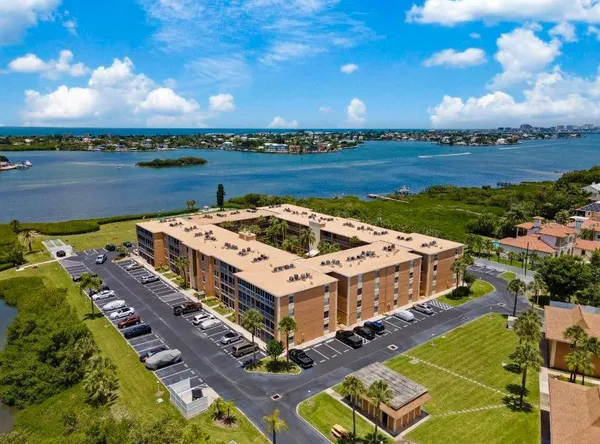 a picture of city view with lake and houses in the back